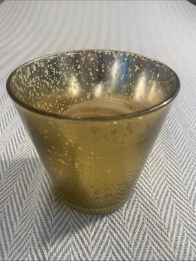 WOODWICK CANDLE IN Mercury Glass Antique Gold Holder. 4 1/2” H X 4 1/8”W USED
